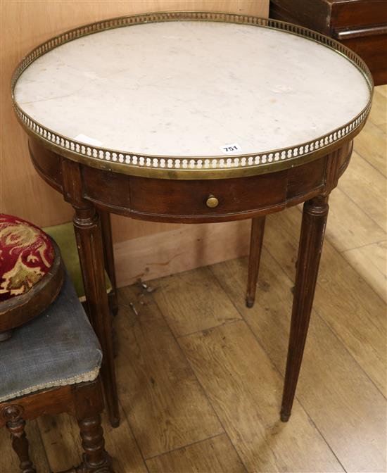 A marble top circular table W.64cm
